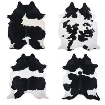 LG/XL Brazilian Black and White hair on cowhide rug. Measures approx. 42.5 - 50 square feet