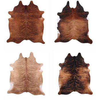 Large Brazilian Brindle hair on cowhide rug. Measures approx. 38-46 square feet