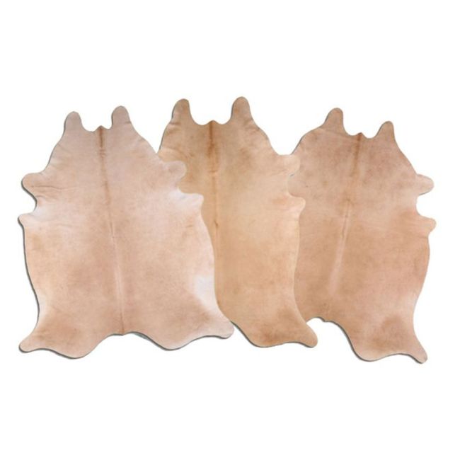 LG&#47;XL Brazilian Beige&#47;Tan cowhide rugs. Measures approx. 42.5-50 square feet